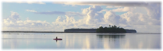 Lagoon and canoe at sunset